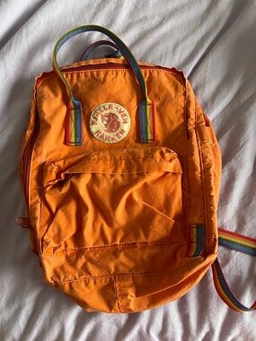 Fjallraven Orange Kanken Backpack with Rainbow Straps